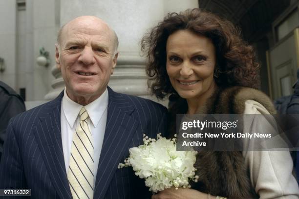 Media mogul Barry Diller and fashion designer Diane Von Furstenberg smile after their wedding at City Hall.