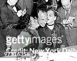 Jose Ferrer is kissed by Gloria Swanson and Judy Holliday at LaZamba at 127 West 52d Street cafe immediately upon receipt of the news from Hollywood...