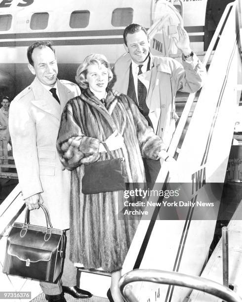 Jose Ferrer with his wife Rosemary Clooney and William Holden, Academy Award Oscar winners are here for the opening of "Country Girl" arrive on TWA...