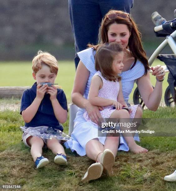 Prince George of Cambridge, Princess Charlotte of Cambridge and Catherine, Duchess of Cambridge attend the Maserati Royal Charity Polo Trophy at the...