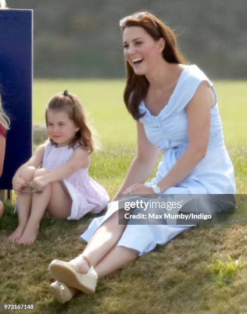 Princess Charlotte of Cambridge and Catherine, Duchess of Cambridge attend the Maserati Royal Charity Polo Trophy at the Beaufort Polo Club on June...