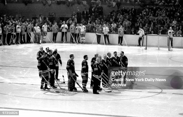 New York Rangers oldtimers join three of the newer ones- Harry Howell , Ed Giacomin and Boomer Geoffrion - in saying goodbye to old Garden at 50th...