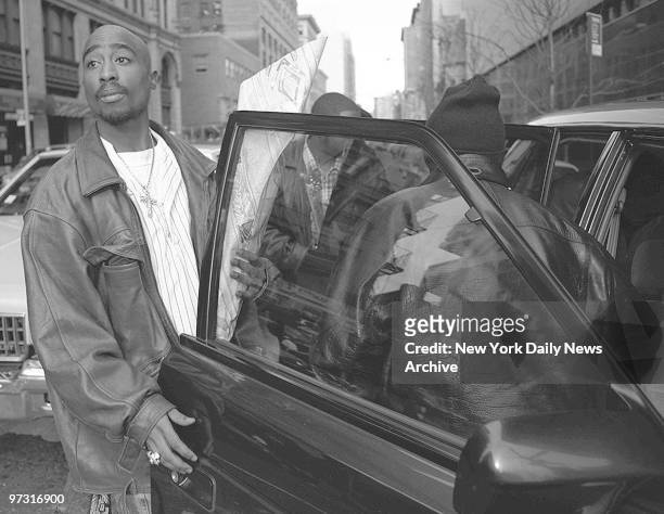 Tupac Shakur outside criminal court.