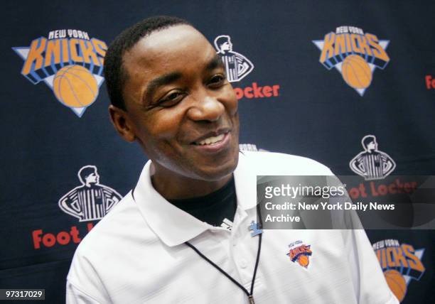 New York Knicks' head coach Isiah Thomas smiles as he speaks to media during a team practice in Greenburgh, N.Y., on the day his multi-year contract...
