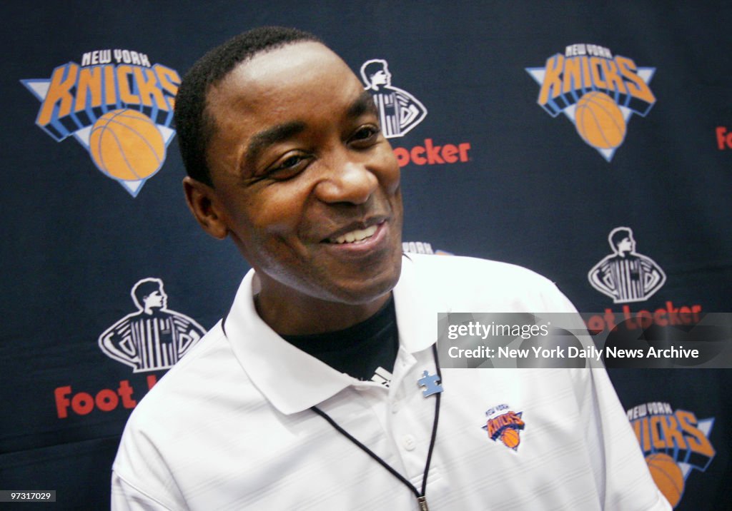 New York Knicks' head coach Isiah Thomas smiles as he speaks