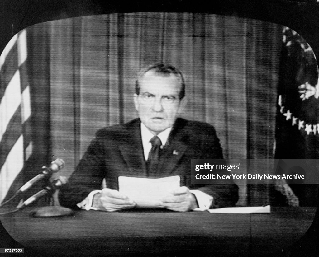 TV image of President Richard Nixon announcing his decision