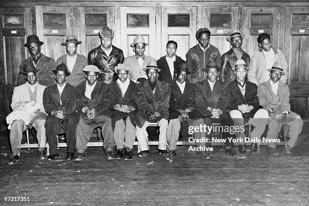 Members of the gang known as the "Socialistic Gents" are arrested. Seated left to right: Daniel Culley, Pete Colbert, James Brunt, Woodrow Miller,...