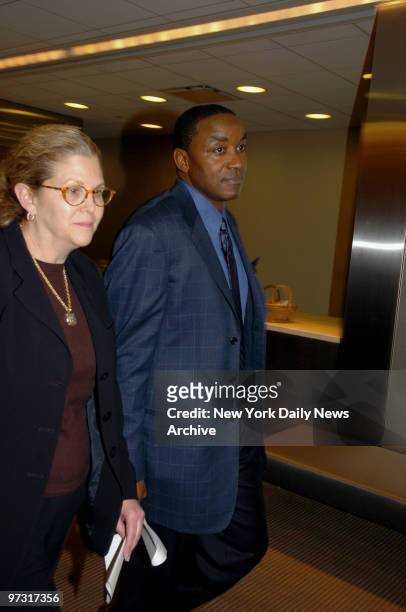 New York Knicks' Isiah Thomas arrives with his attorney, Sue Ellen Eisenberg, for a news conference at her midtown offices. Thomas is being sued for...