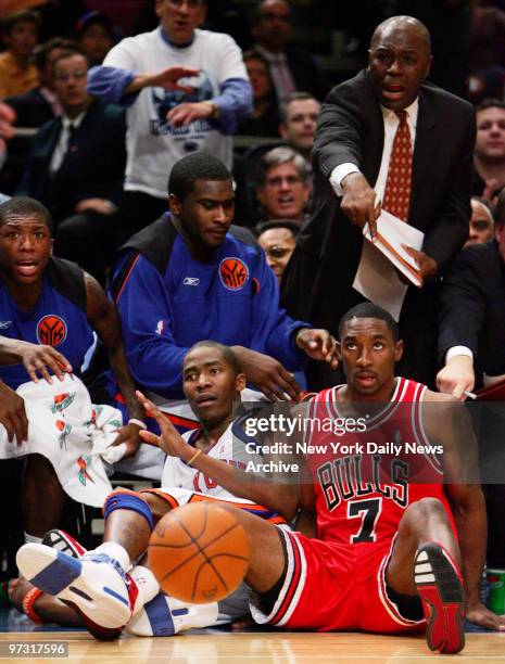 New York Knicks' Jamal Crawford and Chicago Bulls' Ben Gordon land in the Knicks' bench in second half action at Madison Square Garden. The Knicks...