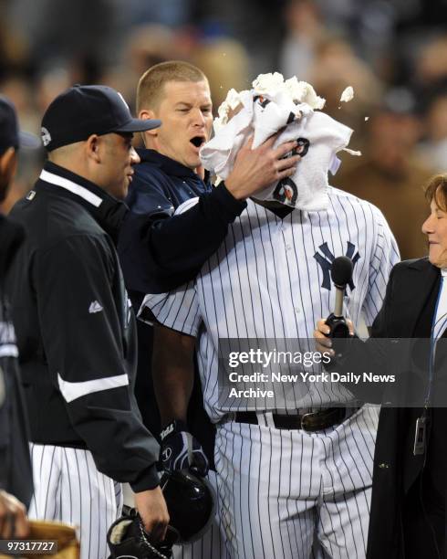 Juan Miranda gets the pie in the face from A.J. Burnett after he hit a game winning walk off single in the bottom of the 9th inning of the Yankees...