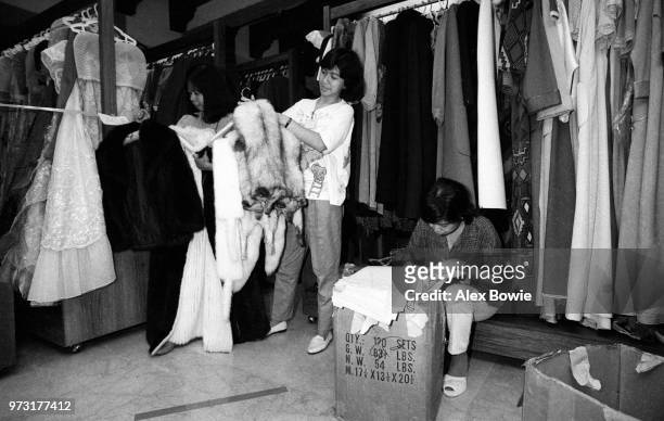 An inventory is made of fur coats belonging to former First Lady of the Philippines, Imelda Marcos, in a huge cellar-wardrobe under her bedroom at...