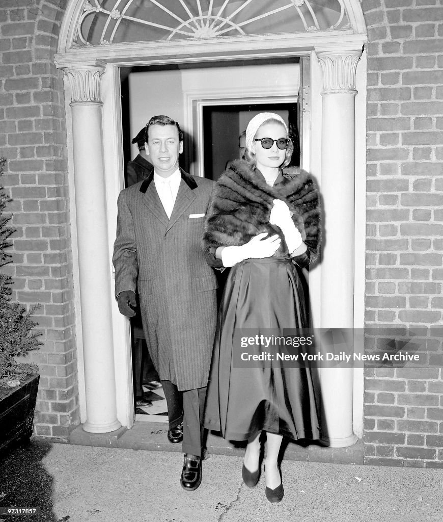 Grace Kelly, clad in a mink stole and topped off with a pink