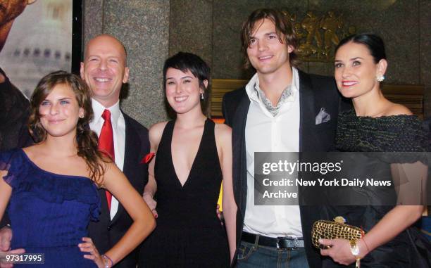 Demi Moore, along with husband Ashton Kutcher, joins Bruce Willis and their daughters Tallulah and Rumer at Radio City Music Hall for the premiere of...