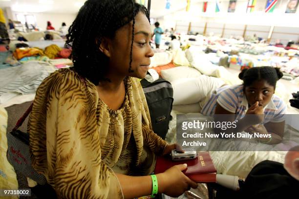 Demikia Watson and her daughter, Jade, struggle to decide whether to take a free plane trip to San Diego, Calif., or to stay at their shelter in...