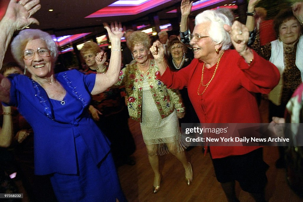 Members of the Amico Senior Center dance at their annual hol