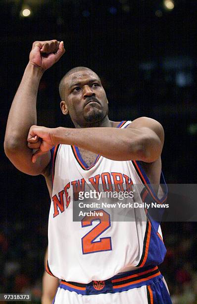 New York Knicks' Larry Johnson makes a jubilant gesture after hitting a three-pointer during game one of the first round of the NBA playoffs against...