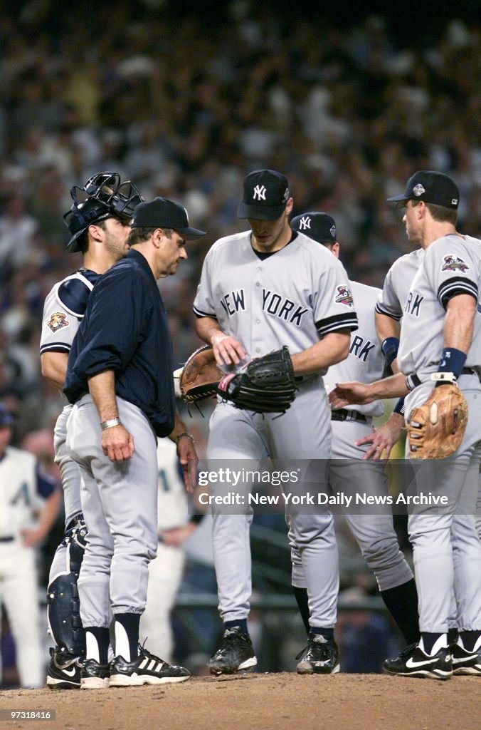 New York Yankees' starting pitcher Andy Pettitte (center) ha