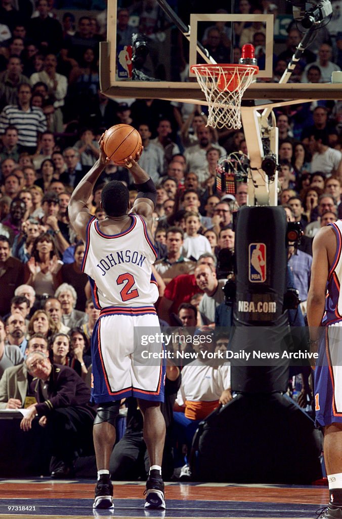 New York Knicks' Larry Johnson sinks a 3-pointer to tie the 