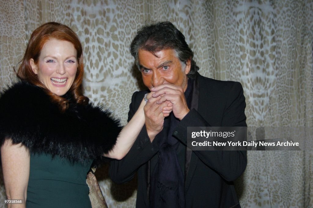 Julianne Moore and fashion designer Roberto Cavalli are on h