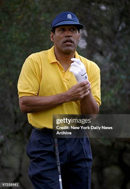 Simpson golfing at the Legend golf course.