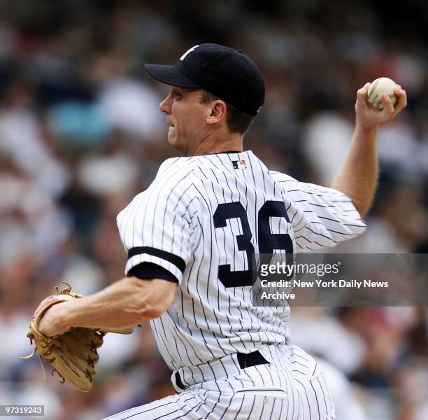 New York Yankees' starting pitcher David Cone on the mound against the Baltimore Orioles at Yankee Stadium. The Orioles won the game, 7-6.