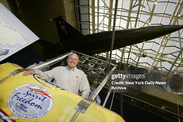 Steve Fossett, who made aviation history by completing the first solo balloon flight around the world in July, is reunited with the capsule in which...