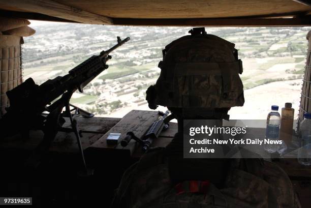 Troops man an outpost in the rugged mountains of Afghanistan, 10th Mountain division 3rd Brigade combat team