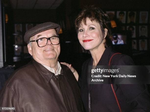 Grammy producer Pierre Cossette and actress Michele Lee get together at his annual Super Bowl party at Sardi's.