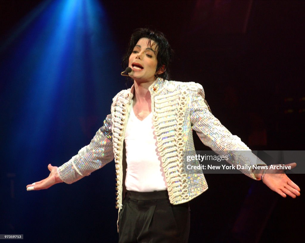 Michael Jackson performs onstage during "A Night At The Apol