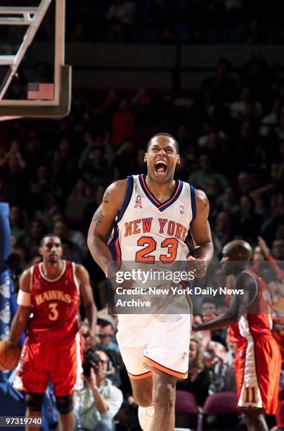 New York Knicks' Marcus Camby yells as he runs up the court in his first game of the season against the Atlanta Hawks at Madison Square Garden. After...