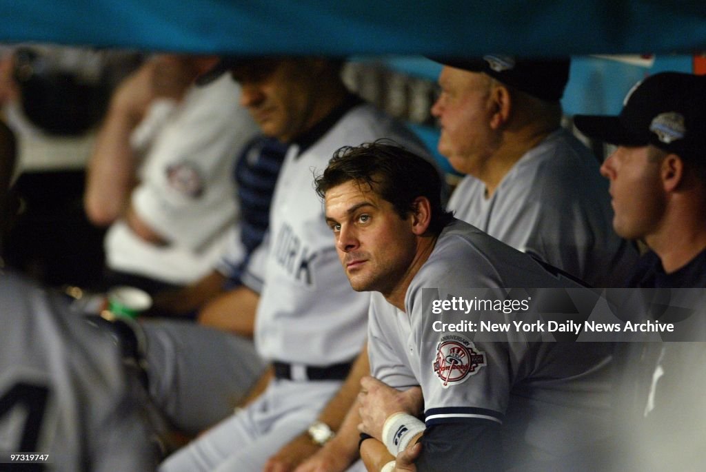 New York Yankees' third baseman Aaron Boone, with manager Jo