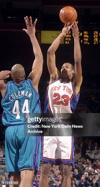 New York Knicks' Marcus Camby shoots over Charlotte Hornets' Derrick Coleman during game at Madison Square Garden. The Knicks defeated the Hornets...