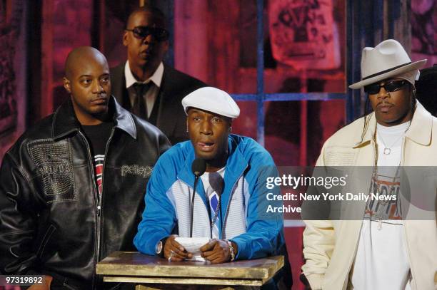 Grandmaster Flash speaks onstage at the Waldorf Astoria hotel flanked by Rahiem and Scorpio as he and the Furious Five were inducted into the Rock...