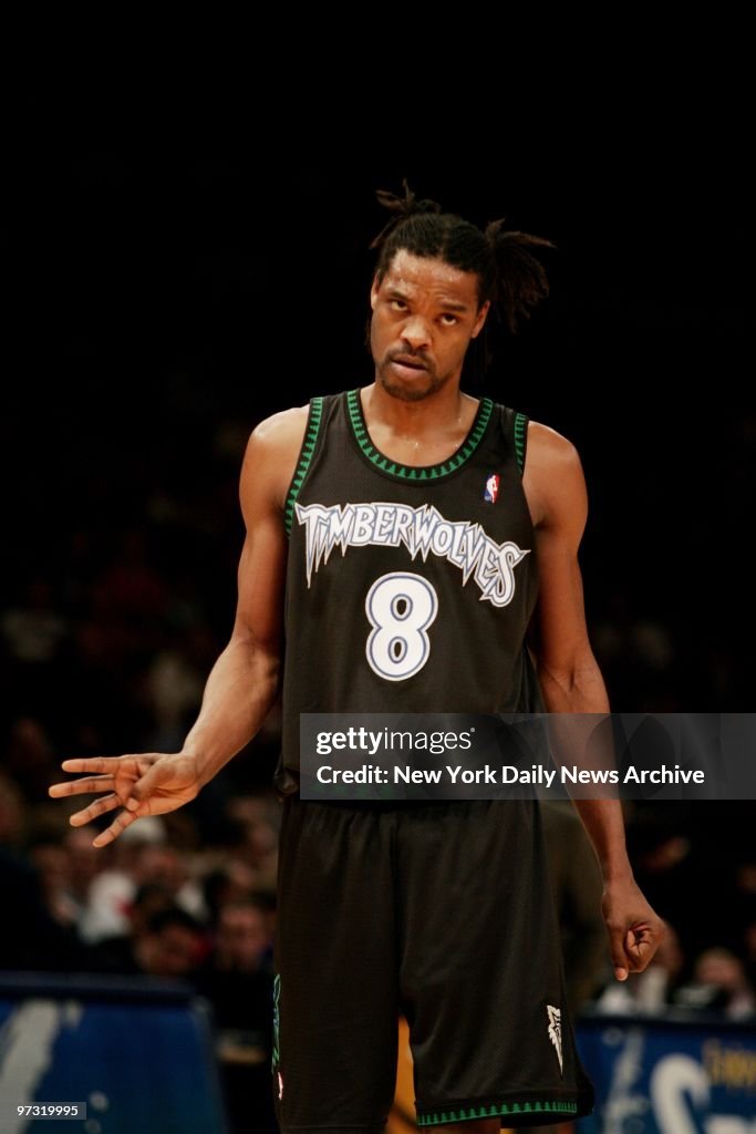 Minnesota Timberwolves' Latrell Sprewell reacts to a play ag