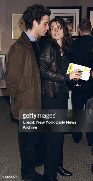 Julia Ormond and date Jon Rubin at opening night party at Sotheby's for the play "Art."