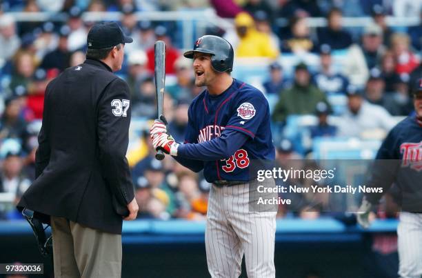 Minnesota Twins' Casey Blake argues with home plate umpire Gary Darling over a strike-out call in the sixth inning of game against the New York...