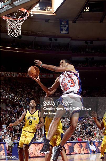 New York Knicks' Marcus Camby goes up for a shot against the Indiana Pacers in the Eastern Conference finals at Madison Square Garden.