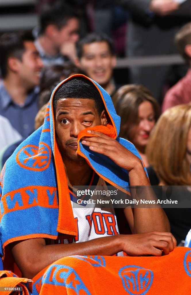 New York Knicks' Marcus Camby on bench during second half of