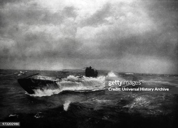 Submarine surfacing off Heligoland. Germany. By Franz Schensky .