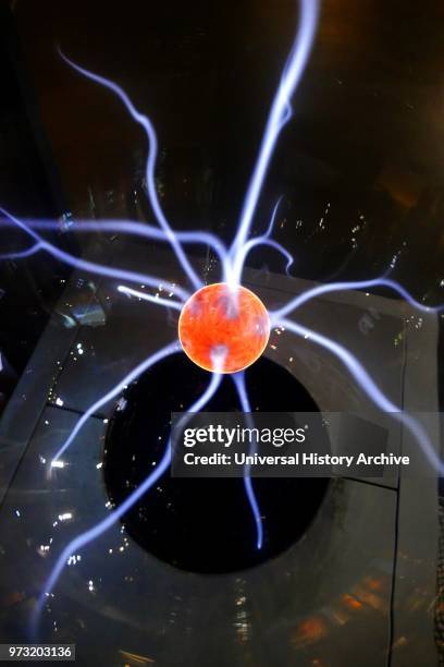 Plasma globe or plasma lamp is a clear glass sphere filled with a mixture of various noble gases with a high-voltage electrode in the center of the...