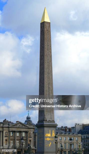 At the center of the Place de la Concorde. Paris is a giant Egyptian obelisk decorated with hieroglyphics exalting the reign of the pharaoh Ramses...