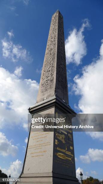 At the center of the Place de la Concorde. Paris is a giant Egyptian obelisk decorated with hieroglyphics exalting the reign of the pharaoh Ramses...