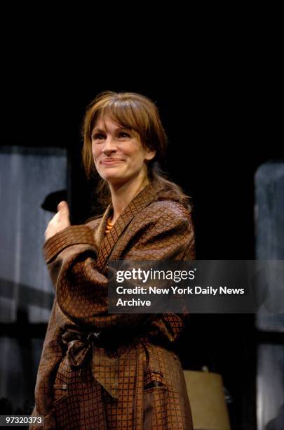 Julia Roberts smiles during the curtain call on the opening night of the Broadway production of "Three Days of Rain" at the Bernard B. Jacobs Theatre...