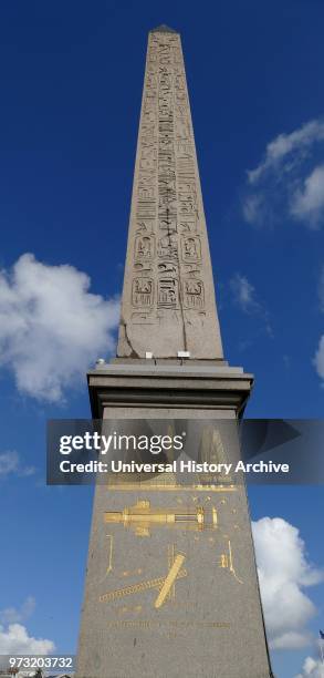At the center of the Place de la Concorde. Paris is a giant Egyptian obelisk decorated with hieroglyphics exalting the reign of the pharaoh Ramses...