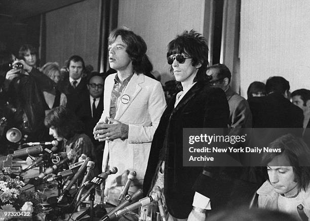 Mick Jagger , lead singer of the Rolling Stones, at press conference with Keith Richards and drummer Charlie Watts .