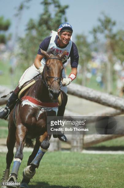 American equestrian Bruce Davidson pictured in action for the United States team on his horse 'J J Babu' during competition to finish in 13th place...