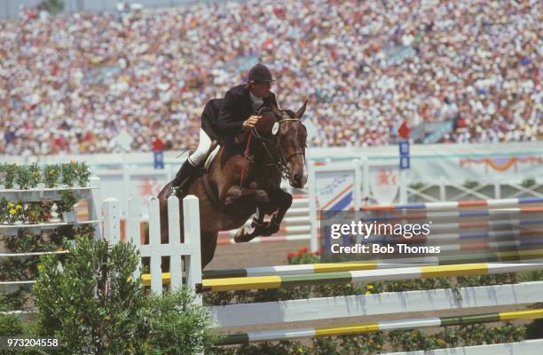 Andrew Nicholson pictured in action for the New Zealand team on his horse 'Kahlua' during competition to finish in 28th place in the Mixed Three-Day...