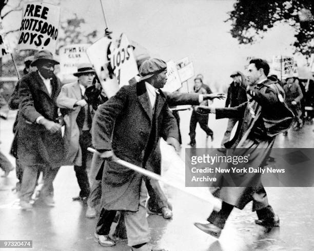 Demonstration on behalf of Scottsboro boys in Washington, DC. The Supereme Court, by a vote of 7-2 reverses the convictions of the Scottsboro boys in...