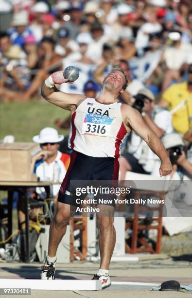 Shot-putter Adam Nelson prepares to throw at Olympia, site of the first Olympics, at the 2004 Summer Olympic Games in Greece. On his final throw,...
