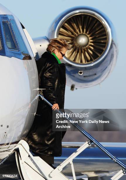 Democratic presidential candidate Sen. Hillary Rodham Clinton disembarks from a private jet in Davenport, Iowa, for another campaign stop the day...